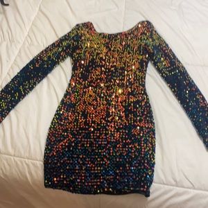 size 00, multicolored sparkles, open back, long sleeves